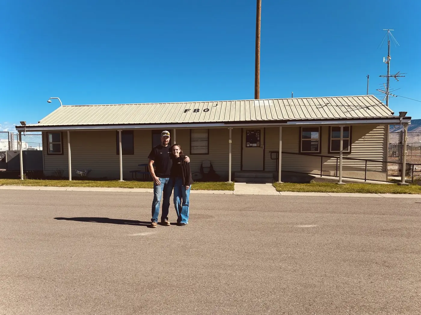 Tyler and Alexis in front of the Gold Mountain Aviation FBO at Battle Mountain